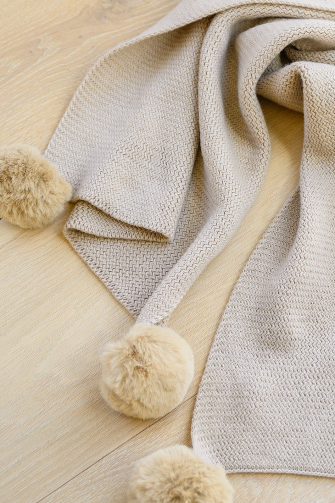 Knitted Fuzzy Pom Pom Scarf In Beige